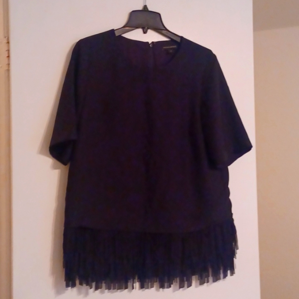 Fun fringe bottom blouse